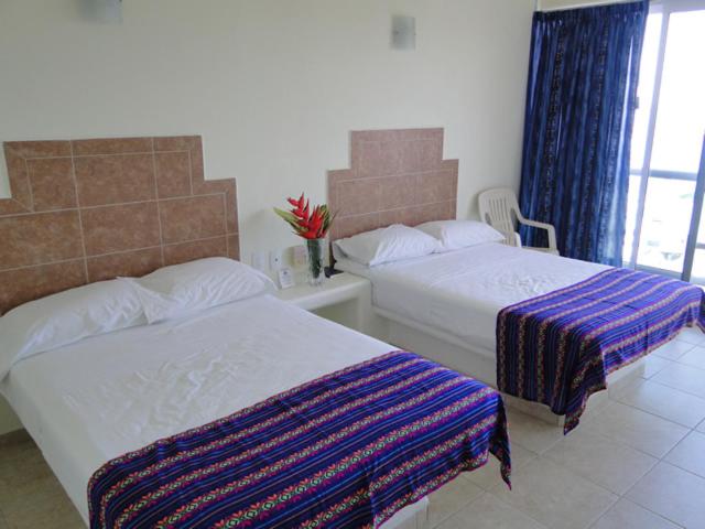 Семейный (Семейный номер с видом на море) отеля Paraiso del Pescador, Ринкон-де-Гуайабитос