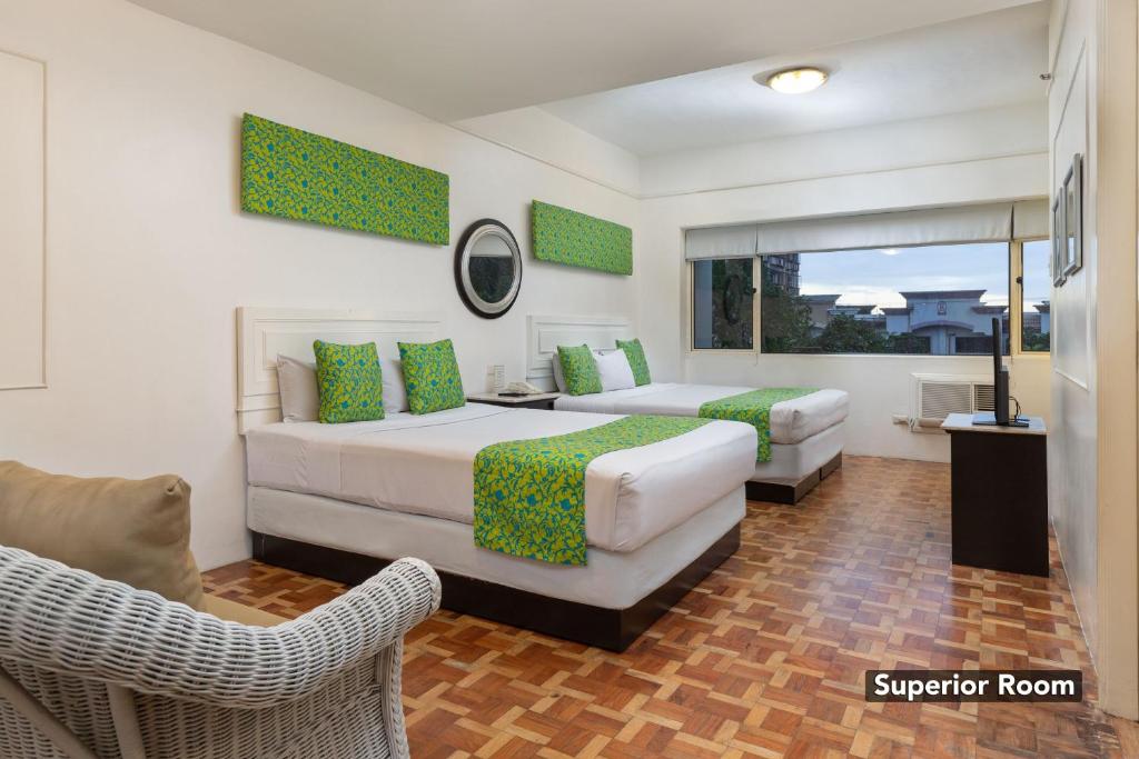 Сьюит (Улучшенный люкс) отеля Orchid Garden Suites, Манила