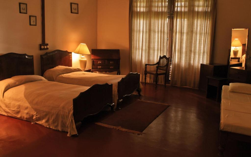 Двухместный (Двухместный номер Делюкс с 2 отдельными кроватями) загородного отеля Ancoombra Tea Estate Bungalow, Матале