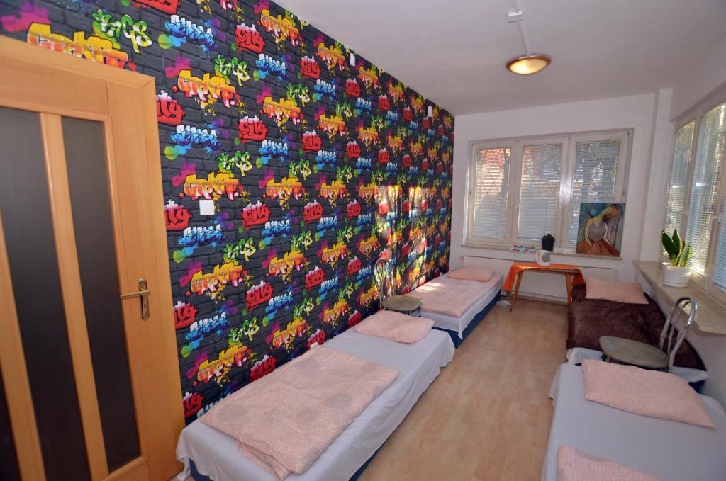 Номер (Односпальная кровать в общем номере с 4 кроватями) хостела Hostel Madeira, Гданьск