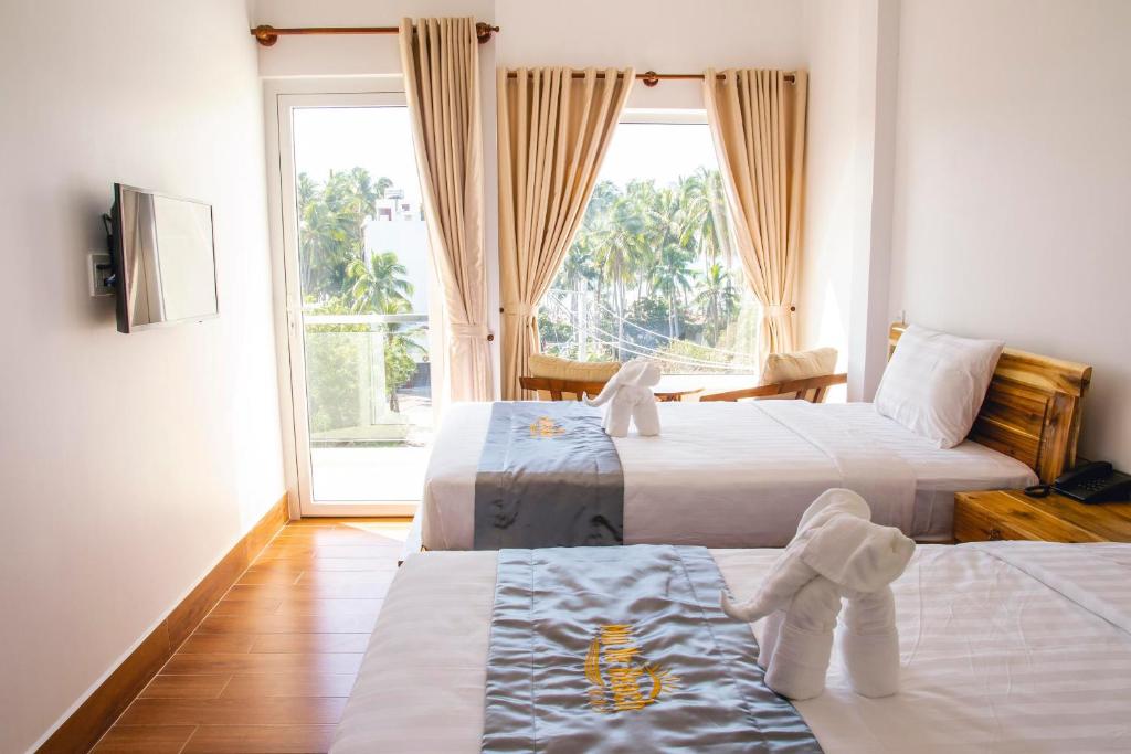 Двухместный (Двухместный номер Делюкс с 2 отдельными кроватями и видом на море) отеля Mui Ne Beach Hotel, Фантхьет