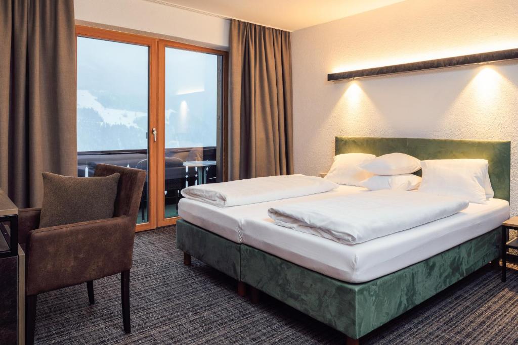 Двухместный (Улучшенный двухместный номер с 1 кроватью) отеля Panoramahotel Fliesserhof, Ладис
