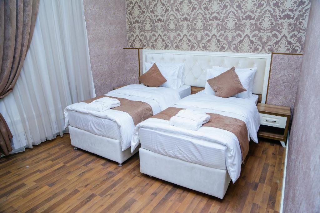 Двухместный (Стандартный двухместный номер с 2 отдельными кроватями) отеля Villa Inn, Баку