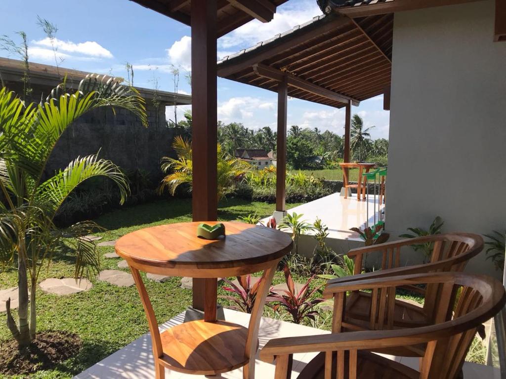 Номер (Бунгало Делюкс с видом на сад), Paraiso Cottage Ubud