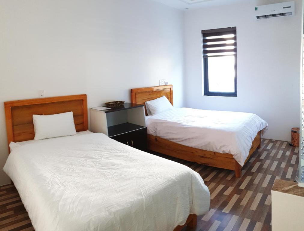 Двухместный (Двухместный номер с 2 отдельными кроватями и собственной ванной комнатой) хостела Kiki's House, Хазянг