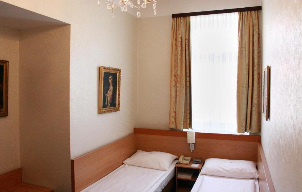 Двухместный (Двухместный номер эконом-класса с 2 отдельными кроватями) отеля Boutique Hotel Donauwalzer, Вена
