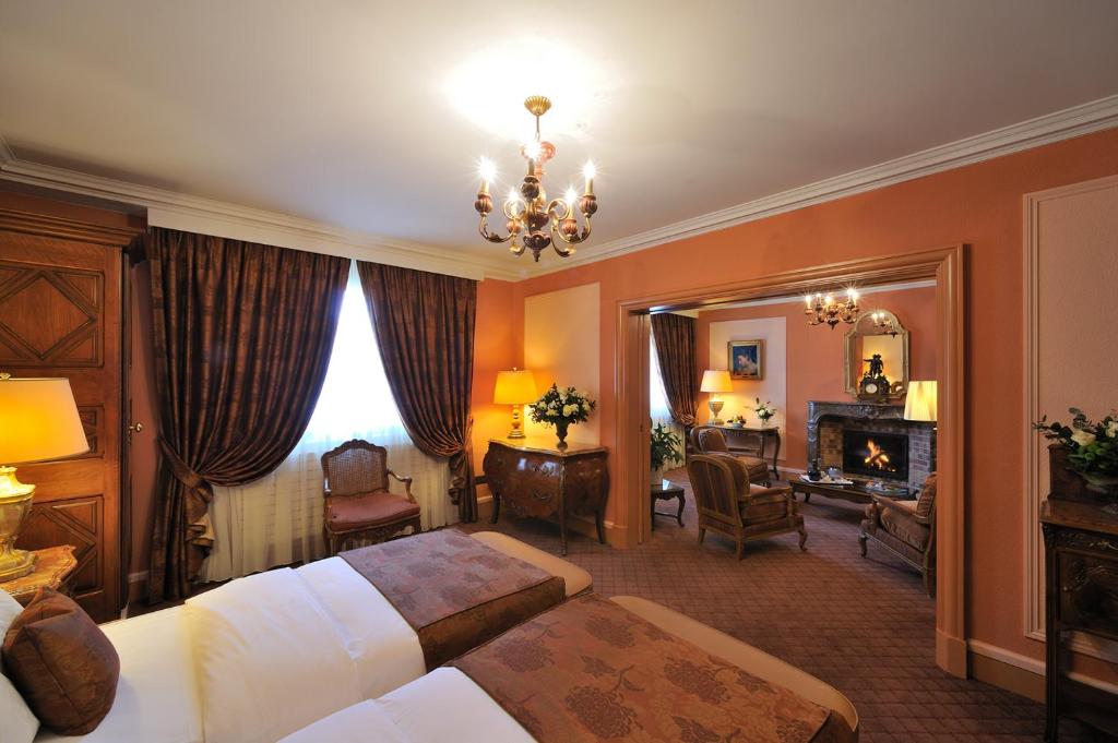 Сьюит (Люкс с 2 отдельными кроватями) отеля Hôtel de la Cigogne, Женева