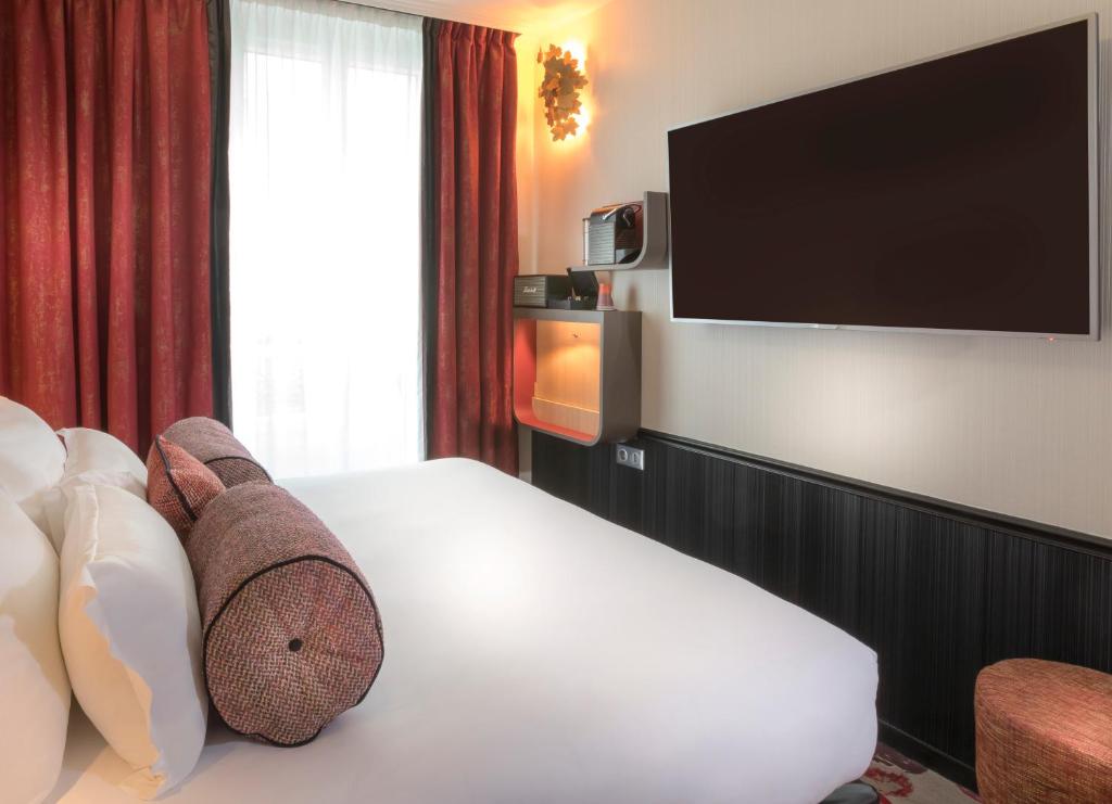 Двухместный (Стандартный двухместный номер с 1 кроватью или 2 отдельными кроватями - Корпус 1) отеля Hotel Du Cadran, Париж