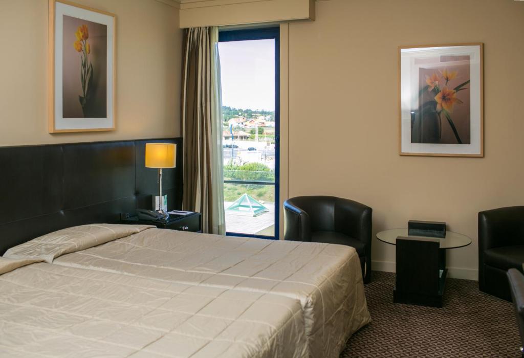 Двухместный (Стандартный двухместный номер с 1 кроватью или 2 отдельными кроватями) отеля Hotel Solverde Spa and Wellness Centre, Эшпинью