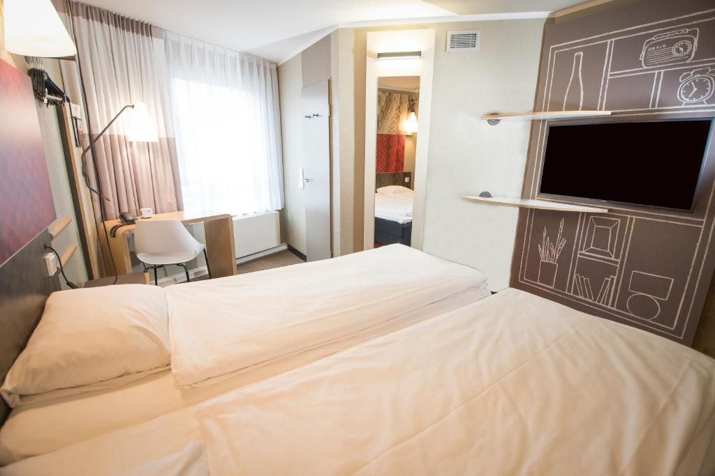 Двухместный (Двухместный номер с 2 отдельными кроватями) отеля ibis Köln Centrum, Кельн