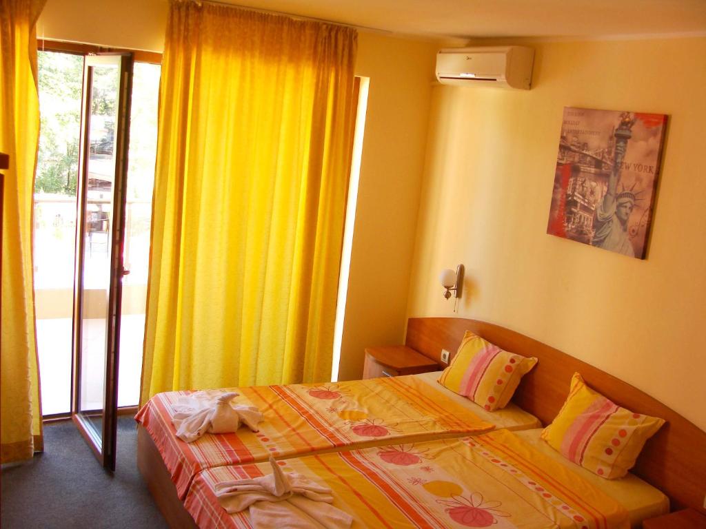 Двухместный (Двухместный номер с 1 кроватью или 2 отдельными кроватями - Бесплатная парковка) отеля Sunny Paradise Hotel, Китен