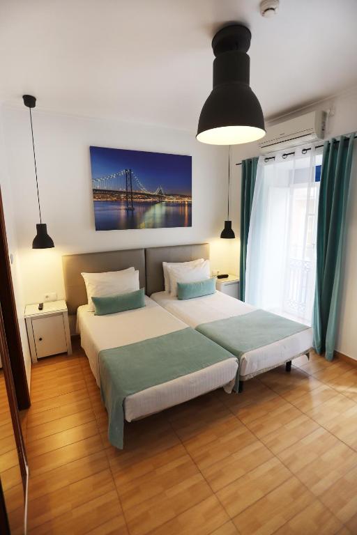 Двухместный (Улучшенный двухместный номер с 1 кроватью или 2 отдельными кроватями) гостевого дома Anjo Azul, Лиссабон