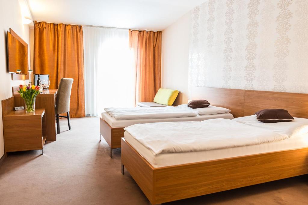 Двухместный (Двухместный номер с 2 отдельными кроватями и террасой) отеля Hotel Dastan, Подгайска
