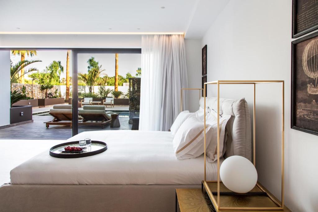 Сьюит (Улучшенный люкс с собственным бассейном) отеля Lango Design Hotel & Spa, Adults Only, Кос