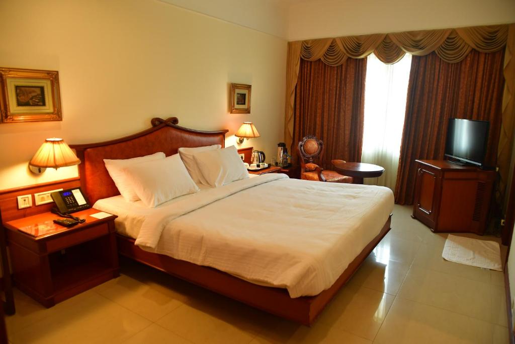Двухместный (Клубный двухместный номер с 1 кроватью или 2 отдельными кроватями) отеля Maurya Rajadhani, Тривандрум