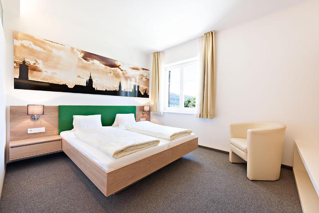 Двухместный (Стандартный двухместный номер с 1 кроватью, вид на озеро) отеля Strandhotel Kärntnerhof, Фельден-ам-Вёртерзе
