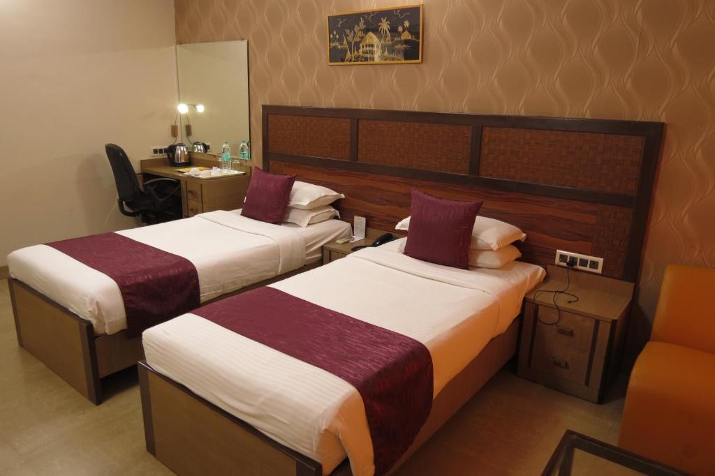 Двухместный (Двухместный номер Делюкс с 1 кроватью или 2 отдельными кроватями) отеля Jyoti Dwelling Hotel, Мумбай