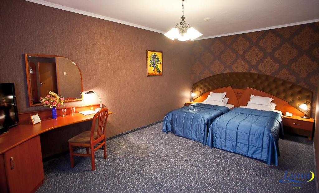 Двухместный (Улучшенный двухместный номер с 2 отдельными кроватями) отеля Luna, Кишинев