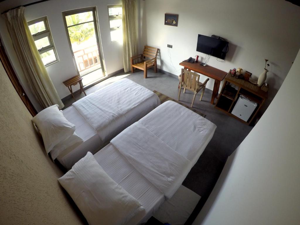 Двухместный (Двухместный номер Делюкс с 1 кроватью или 2 отдельными кроватями и видом на море) гостевого дома Cerulean View Residence, Ханимаду