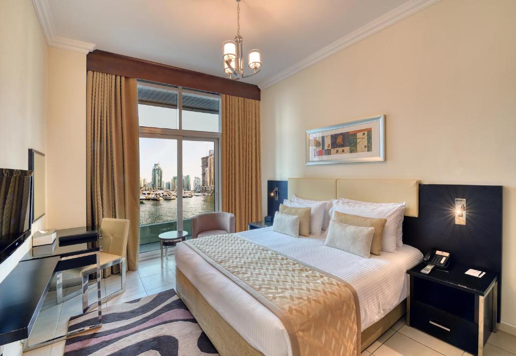 Апартаменты (Апартаменты Делюкс с 1 спальней, бесплатный трансфер от/до пляжа и скидка 15% на еду и напитки) апарт-отеля Pearl Marina Hotel Apartment, Дубай