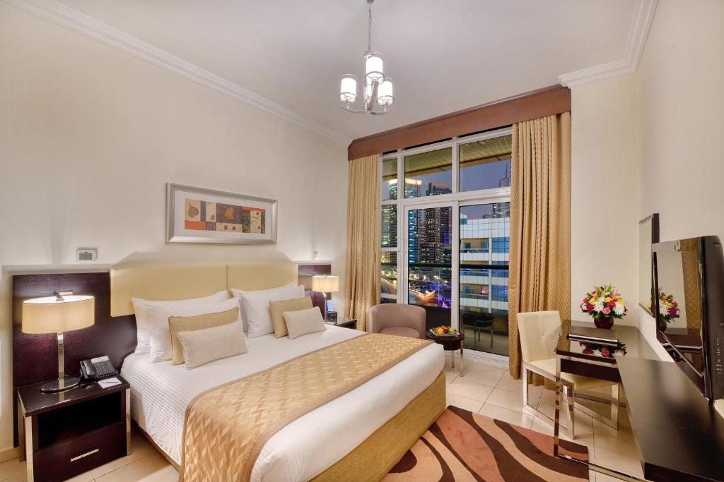 Апартаменты (Апартаменты «Премьер» с 1 спальней, бесплатный трансфер от/до пляжа и скидка 15% на еду и напитки) апарт-отеля Pearl Marina Hotel Apartment, Дубай