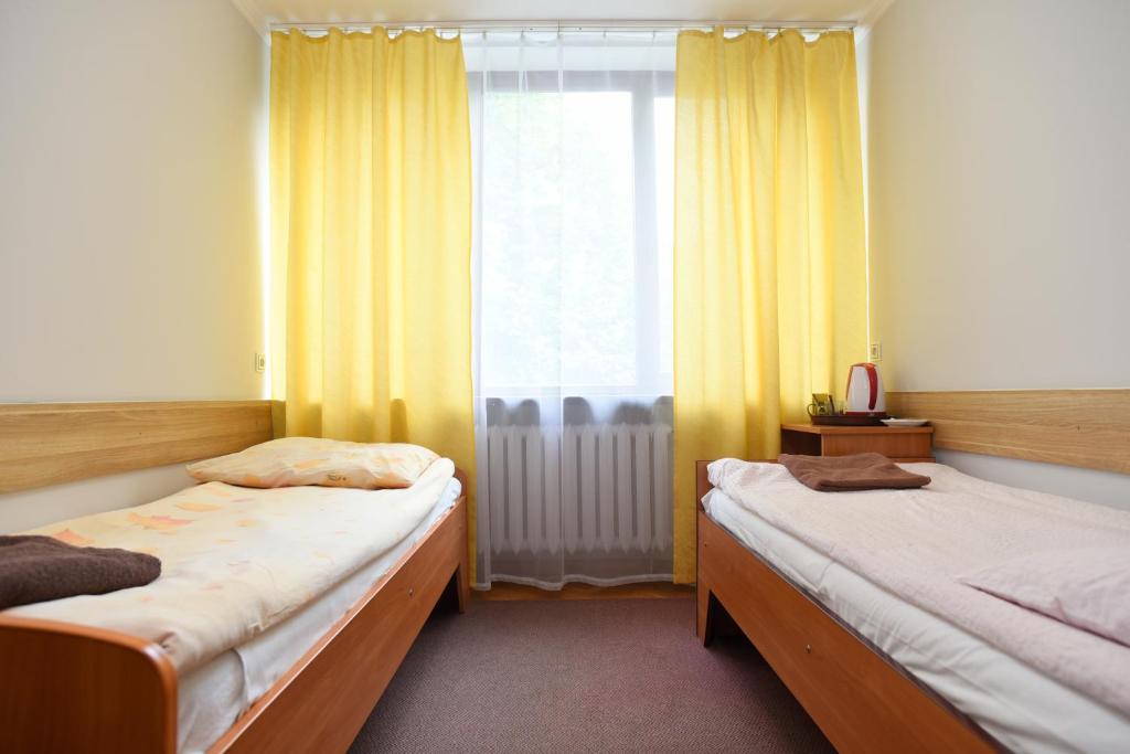 Двухместный (Двухместный номер с 2 отдельными кроватями и собственной ванной комнатой) парк-отеля Dobre Miejsce Варшава