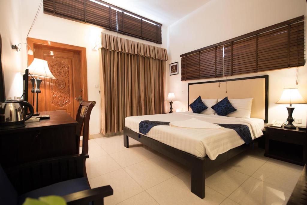 Двухместный (Двухместный номер Делюкс с 1 кроватью и балконом) отеля Homesyn Hotel, Пномпень