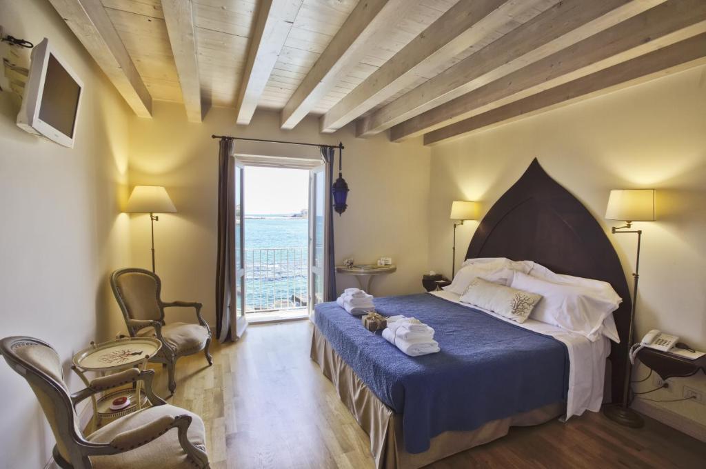 Двухместный (Улучшенный двухместный номер с 1 кроватью и видом на море) отеля Musciara Siracusa Resort, Сиракузы