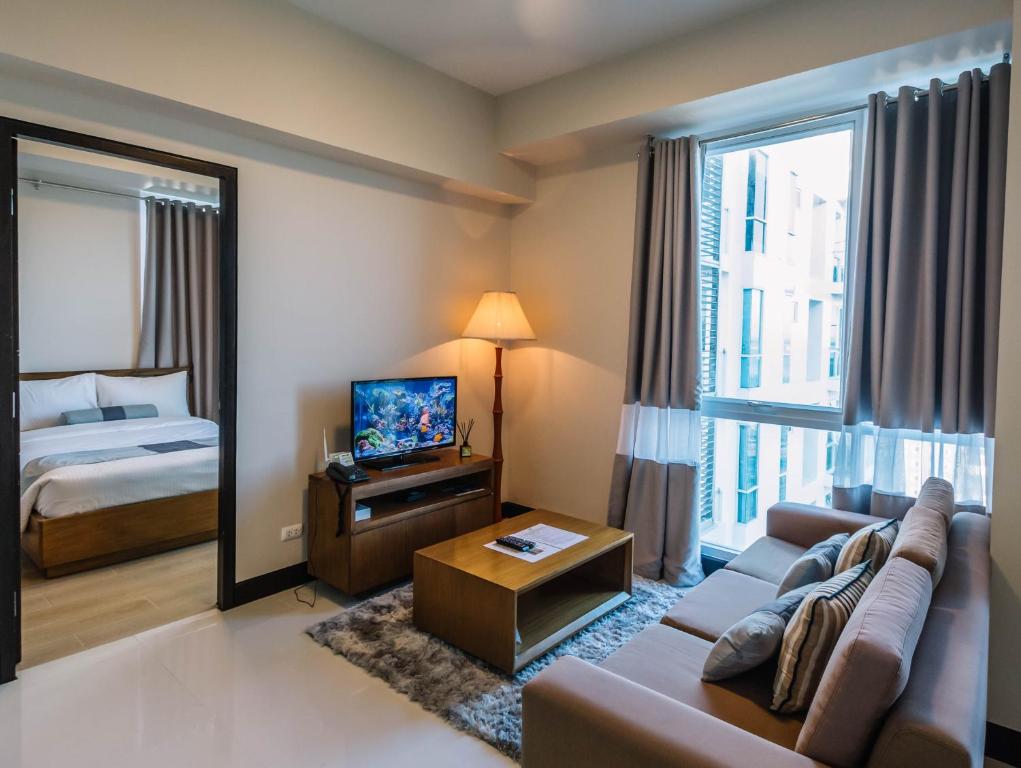 Сьюит (Семейный люкс), C Suites at Mactan Newtown