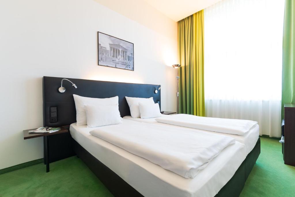 Двухместный (Улучшенный двухместный номер с 2 отдельными кроватями) отеля Rainers Hotel Vienna, Вена