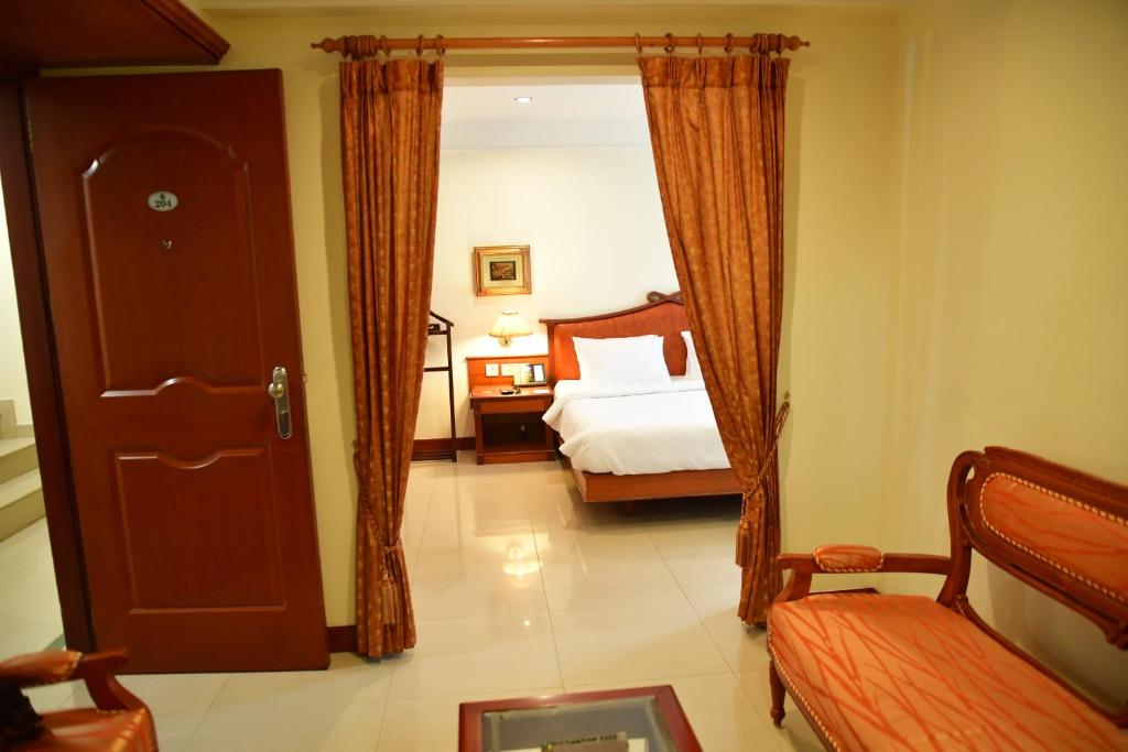 Двухместный (Улучшенный двухместный номер с 1 кроватью) отеля Maurya Rajadhani, Тривандрум