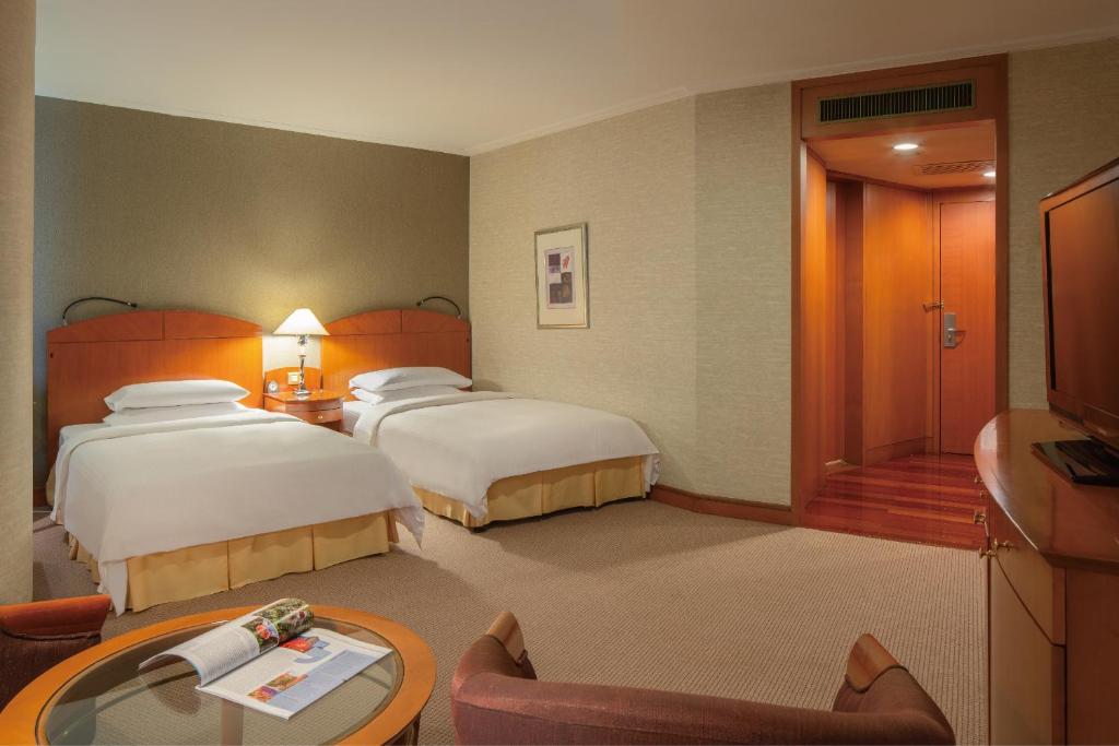 Двухместный (Улучшенный двухместный номер с 2 отдельными кроватями) отеля Hotel Nikko Dalian, Далянь