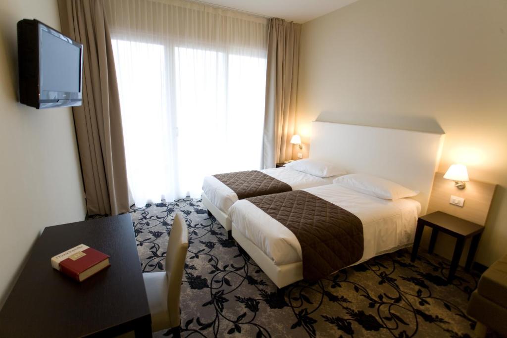 Двухместный (Двухместный номер с 2 отдельными кроватями) отеля Regal Hotel, Брешиа