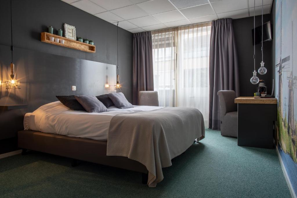Двухместный (Двухместный номер с 2 отдельными кроватями) отеля Hotel Villa Flora, Лейден