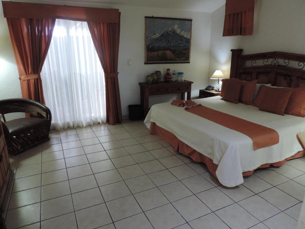 Двухместный (Номер Делюкс с кроватью размера «king-size») отеля Hotel Hospedajes Del Rey, Колима