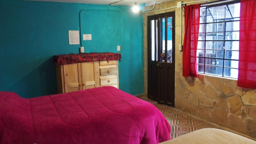 Четырехместный (Четырехместный номер с общей ванной комнатой) отеля kukulpan hostal, Сан-Кристобаль-де-лас-Касас