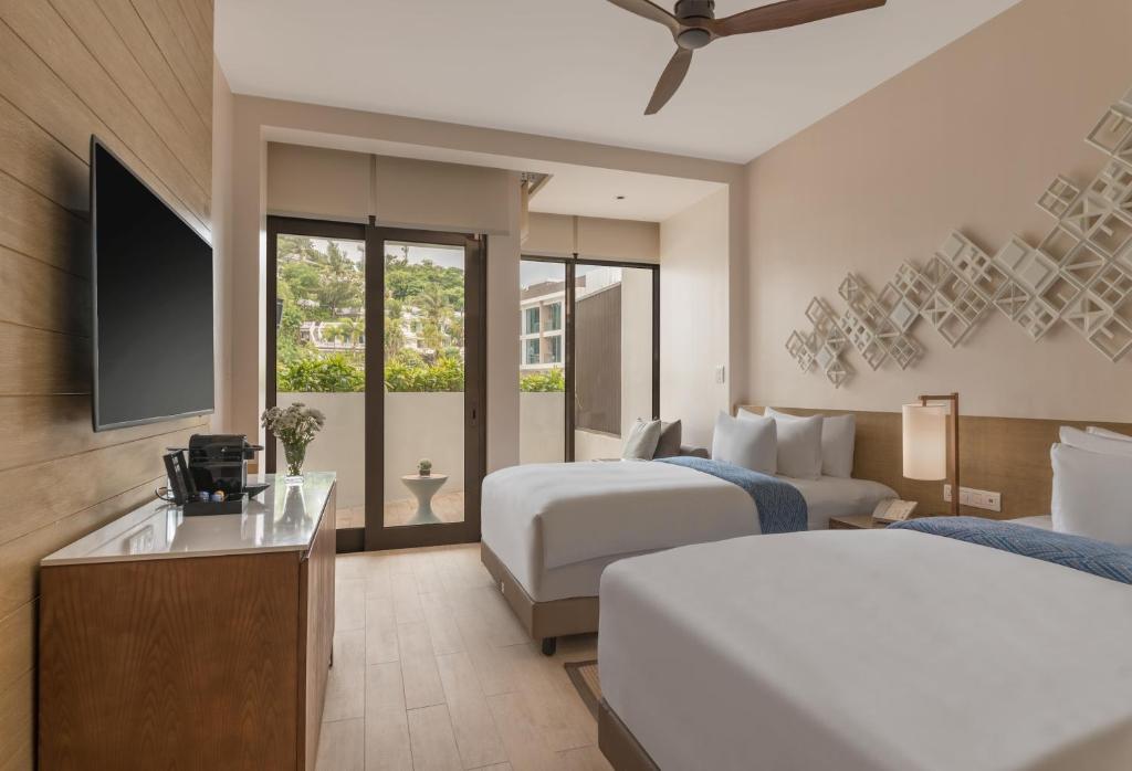 Двухместный (Специальное предложение — Только номер Делюкс) курортного отеля Crimson Resort and Spa Boracay, Боракай