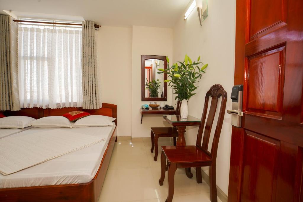 Четырехместный (Четырехместный номер) отеля Nguyen Ha Hotel, Вунгтау