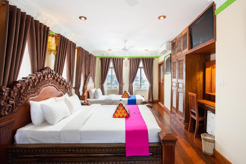 Двухместный (Двухместный номер Делюкс с 2 отдельными кроватями) отеля Okay Palace Hotel, Пномпень