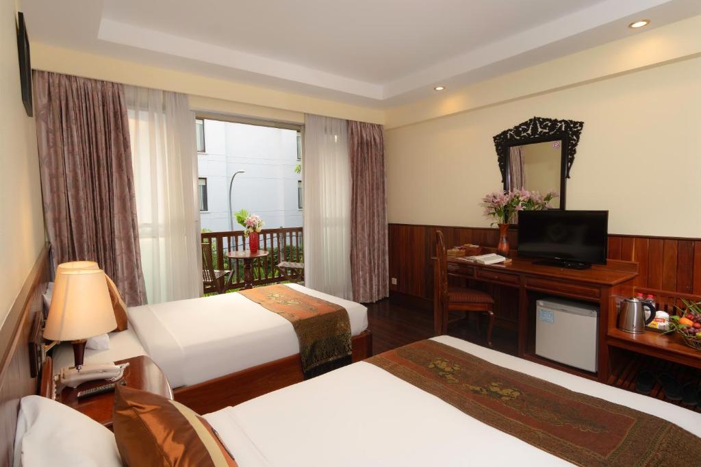 Двухместный (Улучшенный двухместный номер с 2 отдельными кроватями) отеля City River Hotel, Сием Рип