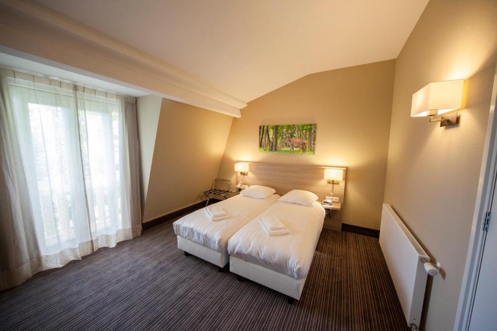 Двухместный (Просторный двухместный номер «Комфорт» с 1 кроватью) отеля Fletcher Hotel Het Veluwse Bos, Арнем