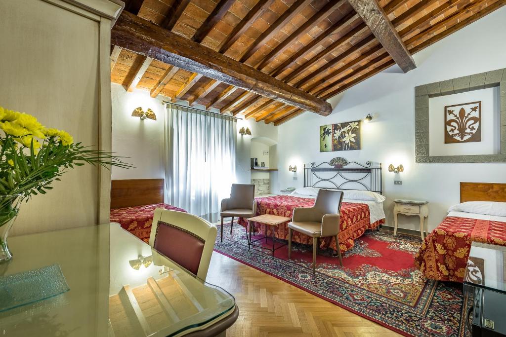 Четырехместный (Четырехместный номер) отеля Hotel Collodi Firenze, Флоренция
