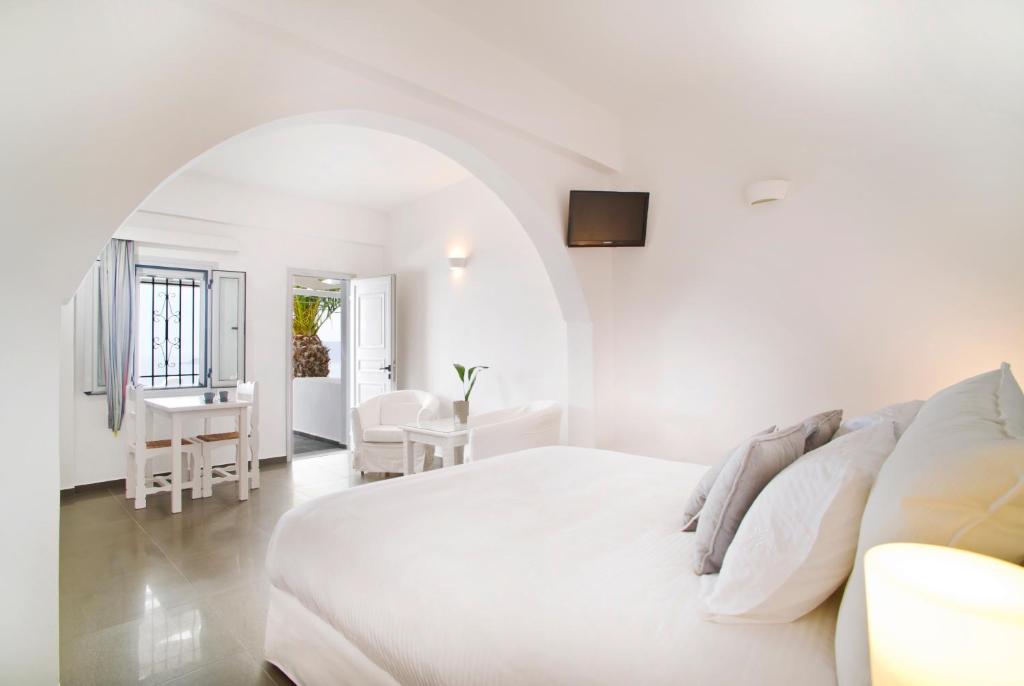 Двухместный (Улучшенный двухместный номер с 1 кроватью и видом на кальдеру) отеля Agali Houses, Фиростефани
