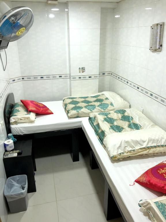 Двухместный (Стандартный двухместный номер с 2 отдельными кроватями) гостевого дома Philippine Hostel, Гонконг (город)
