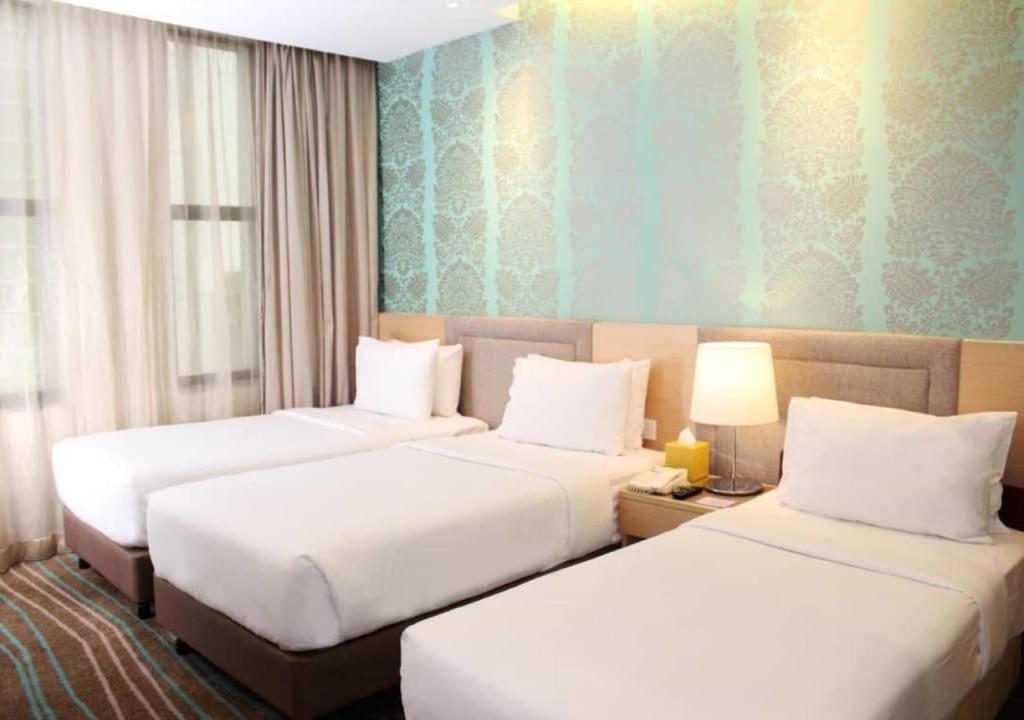 Семейный (Семейный номер Делюкс) отеля Cosmo Hotel Kuala Lumpur, Куала-Лумпур