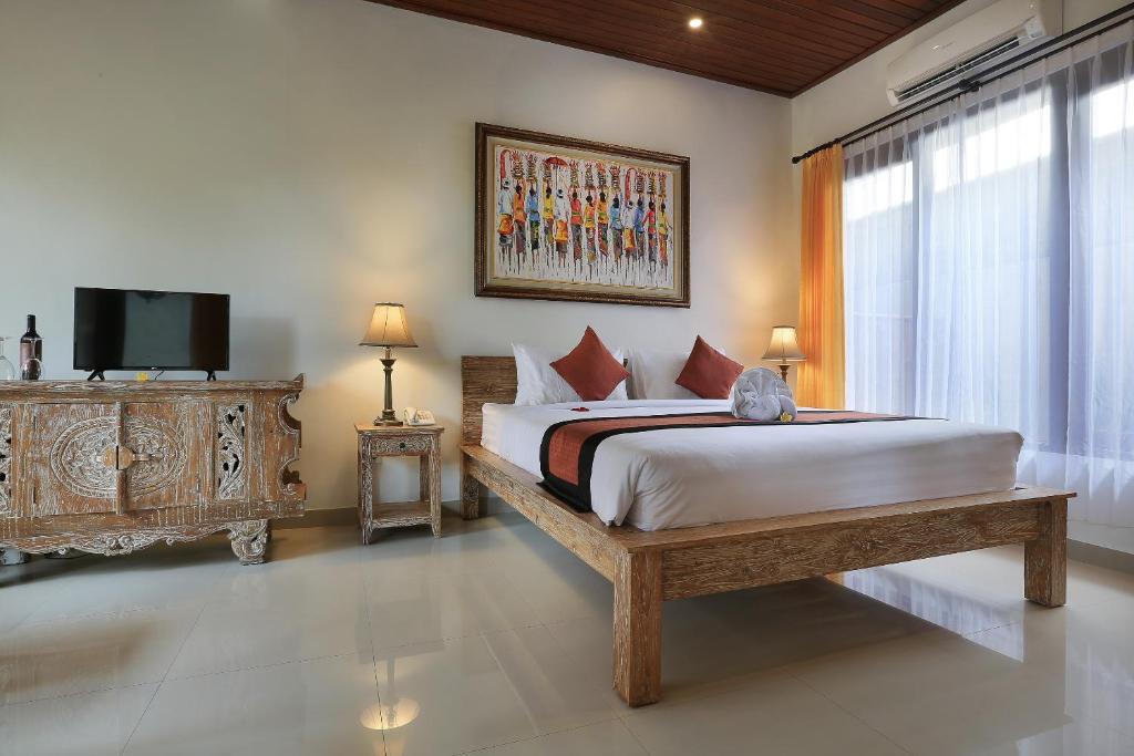Двухместный (Двухместный номер Делюкс с 1 кроватью или 2 отдельными кроватями и балконом) отеля Ketut's Place Villas Ubud, Убуд