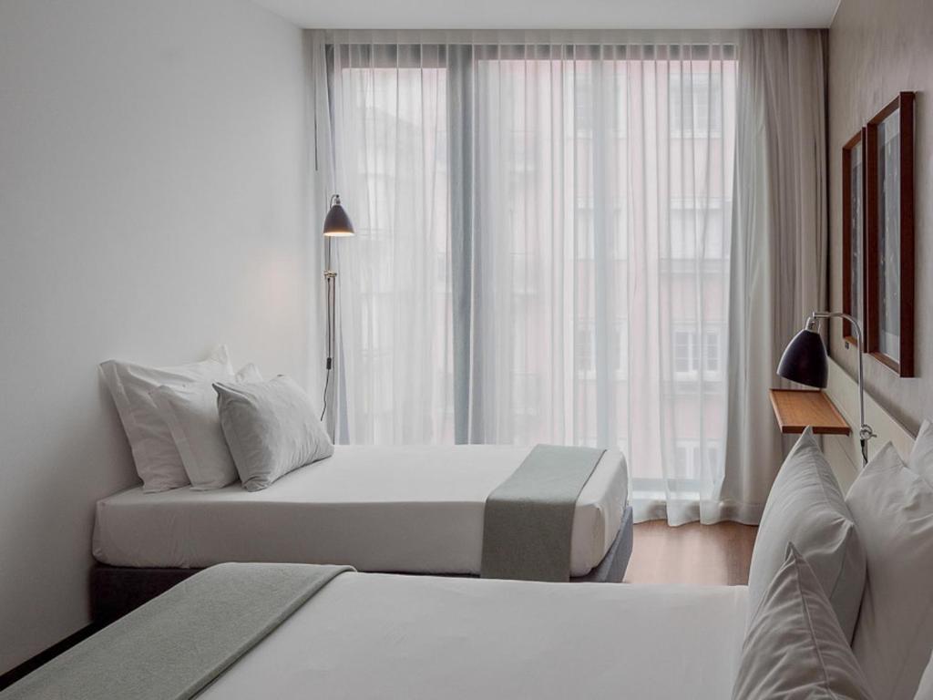 Двухместный (Двухместный номер с 1 кроватью или 2 отдельными кроватями и дополнительной кроватью) отеля Lux Lisboa Park, Лиссабон