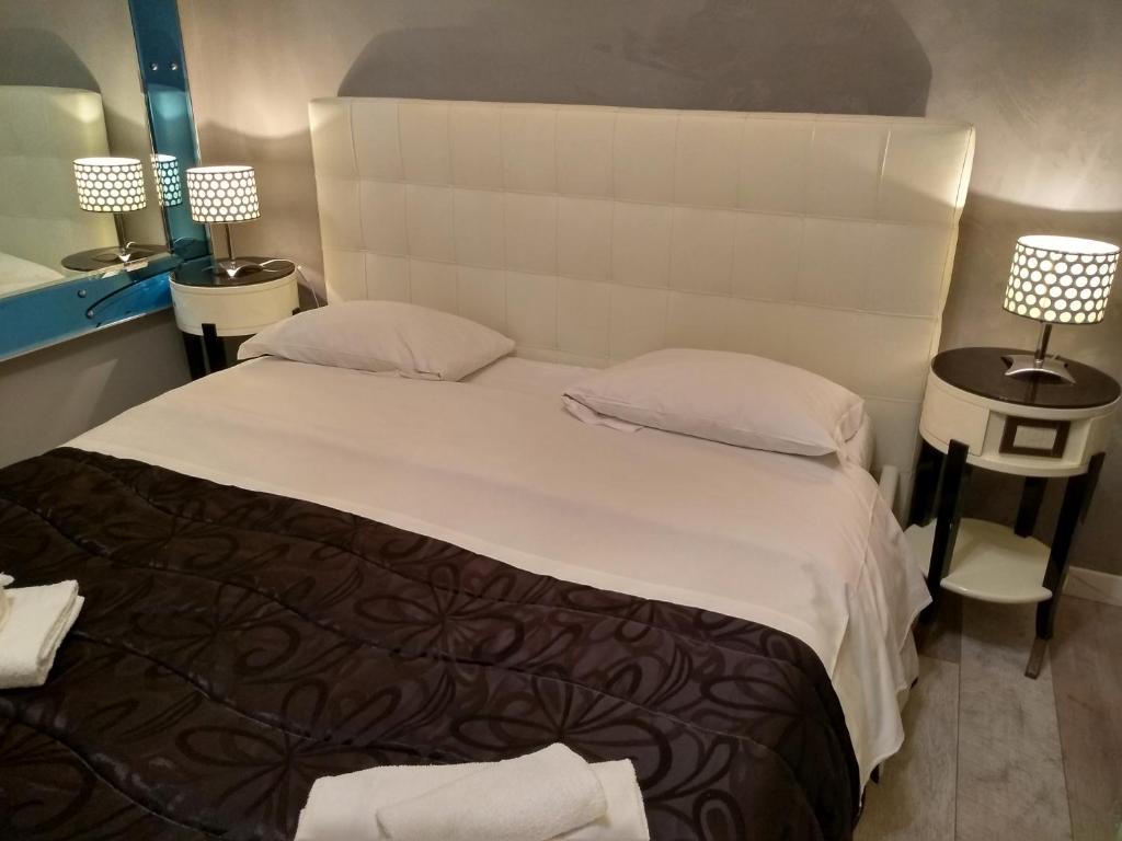 Двухместный (Двухместный номер эконом-класса с 1 кроватью или 2 отдельными кроватями - Via Famagosta 45) гостевого дома Deluxe Rooms, Рим