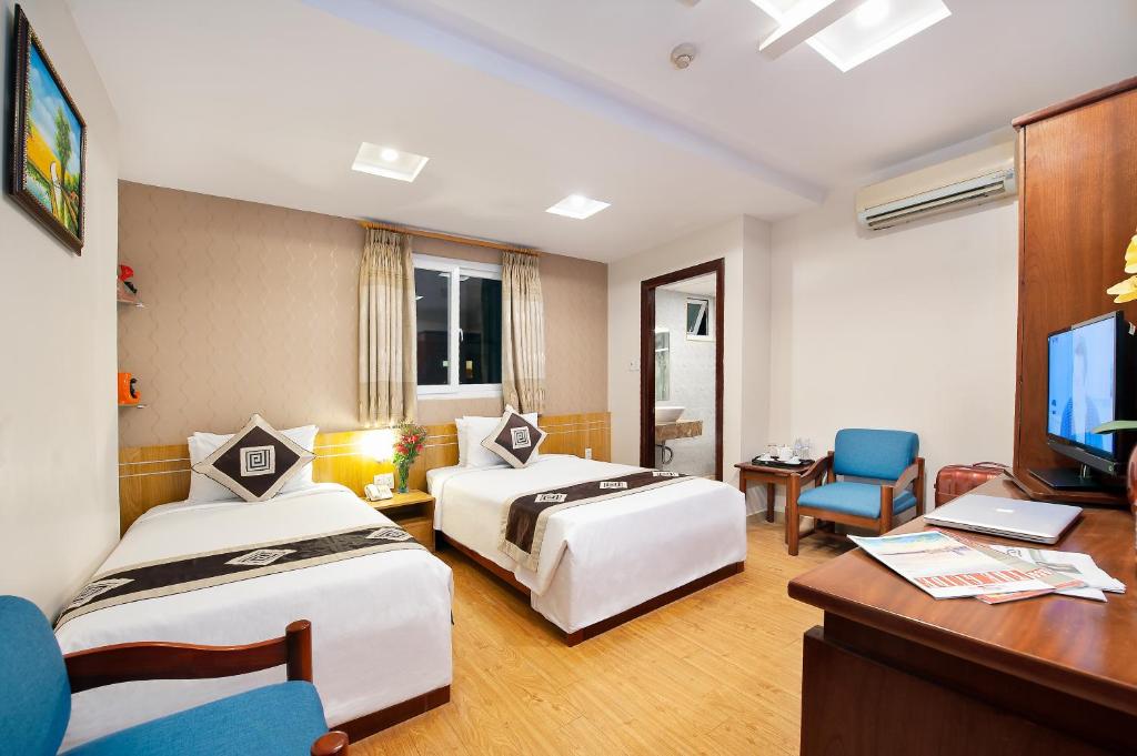 Двухместный (Двухместный номер Делюкс с 2 отдельными кроватями и видом на город) отеля Eden Garden Hotel, Хошимин