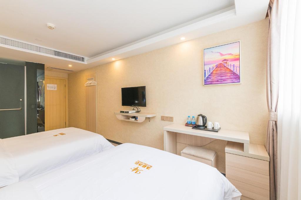 Двухместный (Стандартный двухместный номер с 2 отдельными кроватями) отеля Guangzhou Mufeng Boutique Hotel, Гуанчжоу